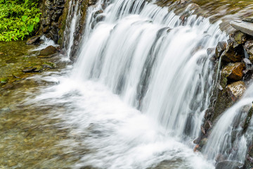 Fototapeta premium Close-up of the waterfall, natural background