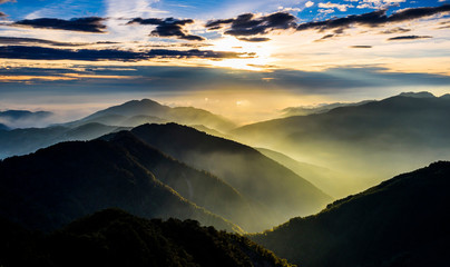 Naklejka na ściany i meble majestic sunset in the mountains' landscape. Hehuan Mountain in Taiwan, Asia.