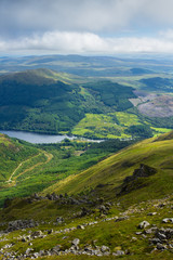 Fototapeta na wymiar Views of Stirlingshire in Scotland on a lovely summersday from the top of the mountain Ben Ledi 