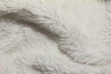 A close up of a furry duvet