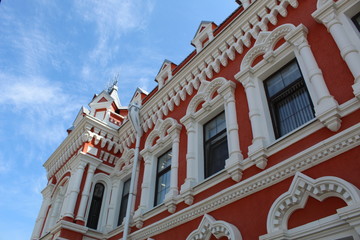facade of a building with a blue sky