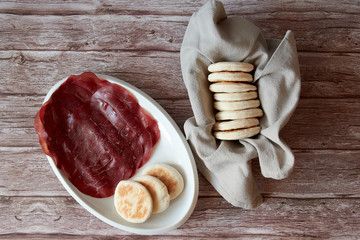 tigelle, typical Italian regional dish, served with bresaola
