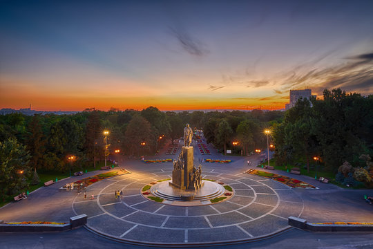 Shevchenko park of Kharkiv in sunset colors and evening lights, Ukraine