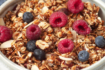 Homemade Granola with fresh berries. Healthy Breakfast.