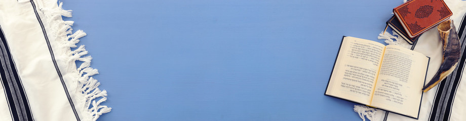 religion image of Prayer book and Shofar (horn) jewish religious symbols. Rosh hashanah (jewish New Year holiday), Shabbat and Yom kippur concept