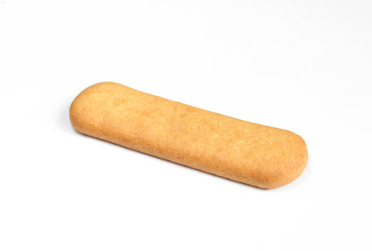 Single brown stick biscuit isolated on white background. Sweet appetizer