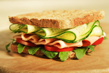 Delicious wholegrain sandwich with salad greens