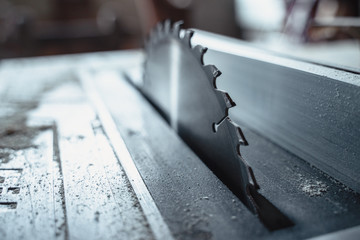 table saw in workshop. Space for copy text.