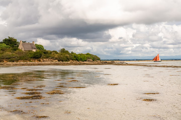Fototapeta na wymiar Brittany, panorama of the Morbihan gulf, view from the Ile aux Moines, with a traditional boat