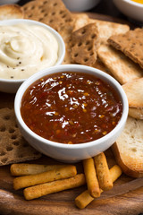 bread snacks and sauces, top view