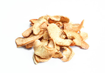 Dried slices of apple isolated on white background. Pile of meal ingredients