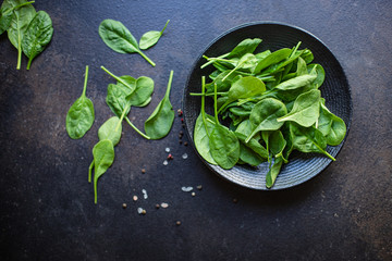 spinach green juicy leaves organic salad serving portion size natural product top view place for...