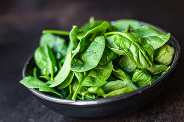 spinach green juicy leaves organic salad serving portion size natural product top view place for text copy space keto or paleo diet raw