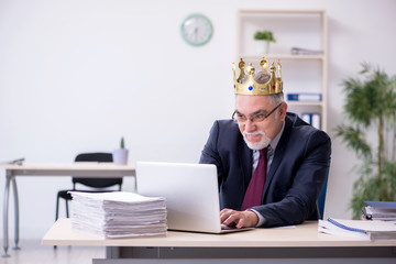 Old king businessman employee at workplace