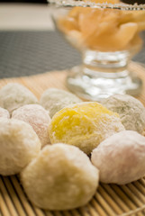 Traditional dessert, sticky sweets known as mochi with crush peanut filling inside 
