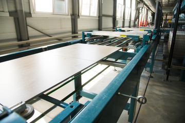 Factory for production of ceramic tiles. Conveyor line for ceramic tile at heavy plant
