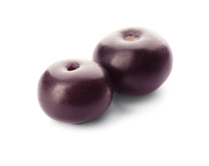 Fresh ripe acai berries isolated on white