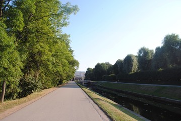 
road in the park along the canal
