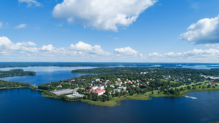 Aerial birds eye view of the Ikaalinen city at sunny summer day in Finland. Aerial panoramic cityscape.