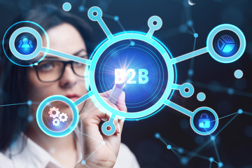 Business, Technology, Internet and network concept. Young businessman working on a virtual screen of the future and sees the inscription: