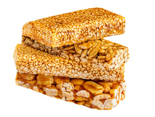 Nut bar with peanuts  and honey syrup  isolated on white background. Muesli  chunks close up