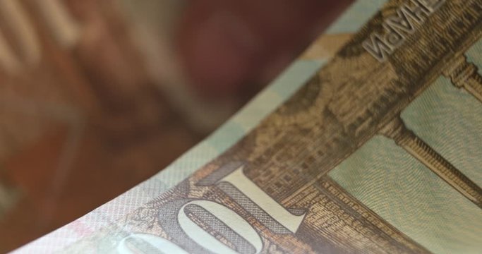 Counting 1000 denars banknotes Macedonian currency, finance closeup footage