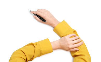 Woman holding pen on white background, top view