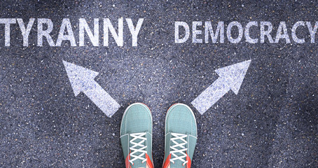 Tyranny and democracy as different choices in life - pictured as words Tyranny, democracy on a road to symbolize making decision and picking either Tyranny or democracy as an option, 3d illustration