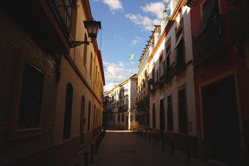 narrow street in the old town of seville