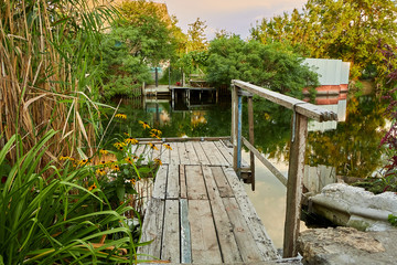 Small wooden bridge on small river