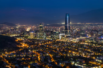 Panoramic view of Santiago cityscape at night, Chile, South America.