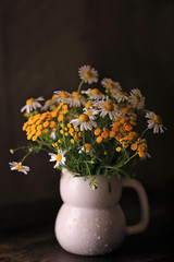 bouquet of yellow flowers and daisies