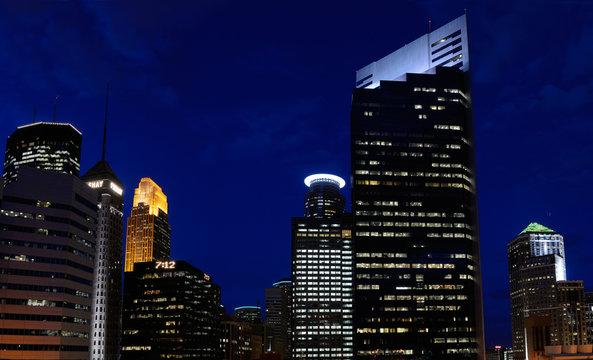 Nightscape of downtown Minneapolis highrise towers after dusk