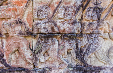 Bas-relief carved on the wall of Angkor Wat