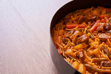 Delicious casserole noodles with pieces of beef and vegetables