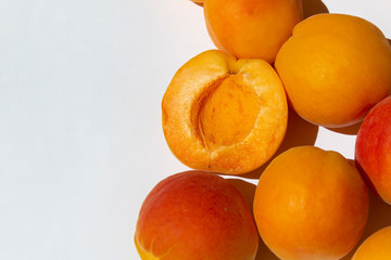 fresh juicy summer organic apricots fruit on a white background 