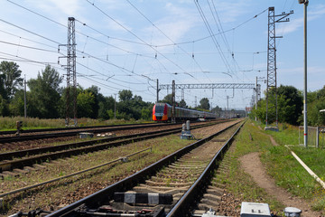 Fototapeta na wymiar Passenger train on rails. Railway.