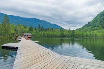 Fototapeta premium vintage wooden pier on the lake