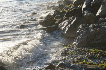 waves crashing on rocks