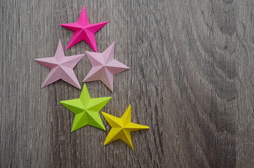 origami paper stars on wooden