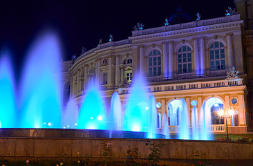Fototapeta premium night view of Opera house in Odessa city, Ukraine. Beautiful city Park and street illumination