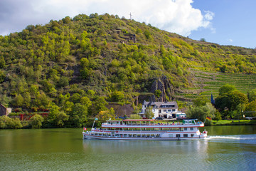 Passenger and river cruise ships on the Moselle river in Treis-Karden - obrazy, fototapety, plakaty