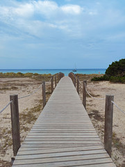 Obraz premium Boardwalk at Son Bou beach, Menorca, Spain