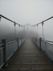 Obraz premium a wooden bridge in the mountains 