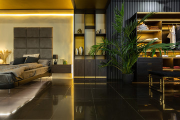 dark modern stylish male apartment interior with lighting, decorative walls, fireplace, dressing...