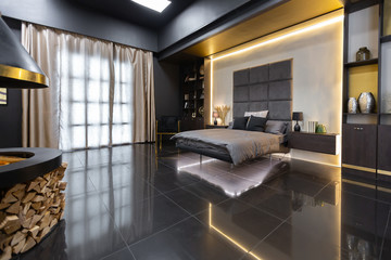 dark modern stylish male apartment interior with lighting, decorative walls, fireplace, dressing...