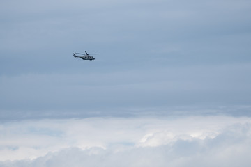 helicopter in the blue sky 