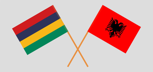 Crossed flags of Mauritius and Albania