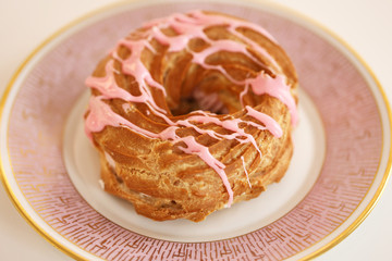 donut with icing sugar and cream