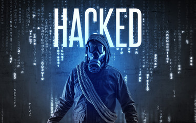 Faceless hacker with HACKED inscription, hacking concept